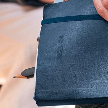 18M WKLY NTBK LG BLK HARD